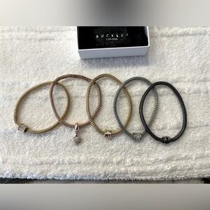Buckley London bracelet set (5). Each with their own bag